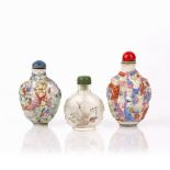 Collection of three snuff bottles Chinese to include two with clobbered form depicting figures,