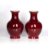 Pair of flambé vases Chinese of baluster form with ribbed decoration down the body, bases with