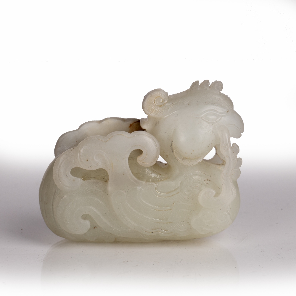 Jade carving of a phoenix Chinese carved in a recumbent position grasping a branch in the beak, - Image 2 of 3