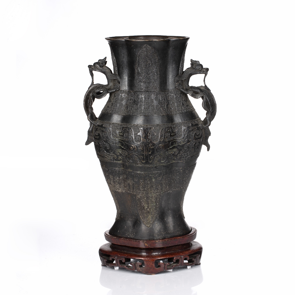 Large Shang style bronze vase Chinese, 19th Century of archaic form with dragon handles and with