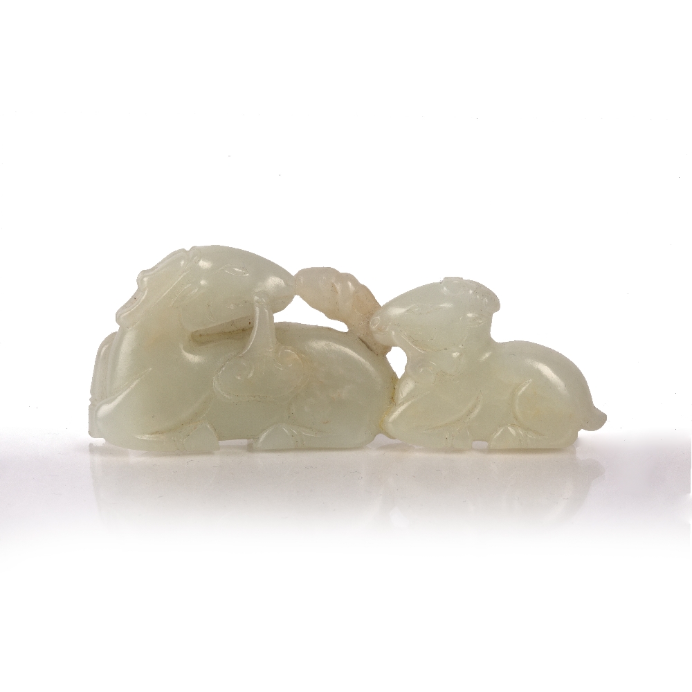 White jade pebble Chinese, 19th Century pierced and carved as a reclining deer and young, both - Image 2 of 2