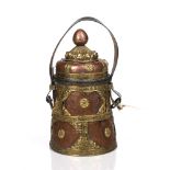 Copper and brass pot Bhutan of tapered form with leather handle, 34cm exc handle Condition: some