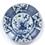 Blue and white plate Chinese, Kangxi period (1662-1722) decorated to the centre with a lotus