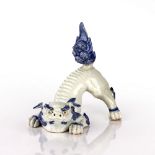 Hirado porcelain model of a Kylin Japanese, circa 1870-1880 crouching with its tail raised, in white