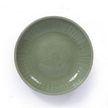 Longquan celadon dish Chinese, Ming dynasty with a lobed border, 27cm across Provenance: Acquired by