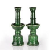 Pair of green glazed temple candle sticks Chinese, late 19th Century each with a ribbed design to