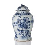 Blue and white baluster vase and cover Chinese, 19th Century decorated to the body with flowering