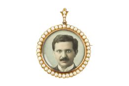A half pearl locket brooch/pendant, designed as a circular glazed aperture bordered by half