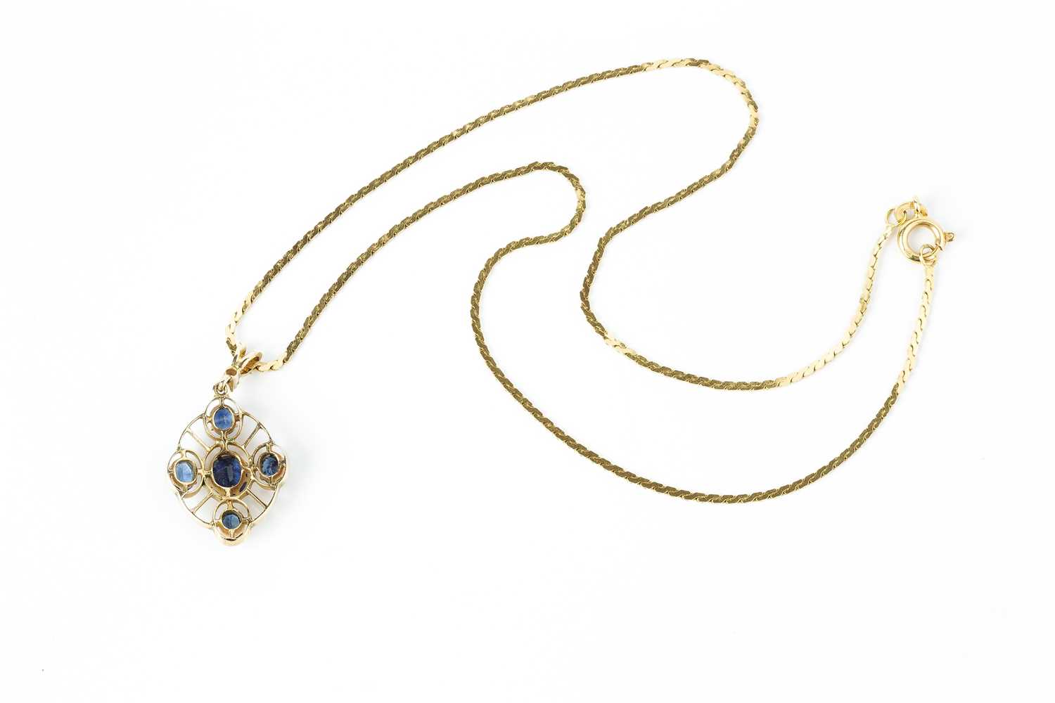 A sapphire and diamond set pendant on chain, the oval openwork pendant with a cluster of graduated - Image 2 of 2