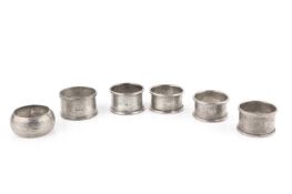 A collection of six silver napkin rings, various dates and makers, 3.5oz overall (6)