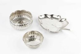 A Peruvian silver leaf shaped dish, with planished border, stamped '925 Sterling Peru', 26cm long,