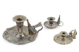 A 19th century Sheffield plate chamberstick, with snuffer, four further smaller plated