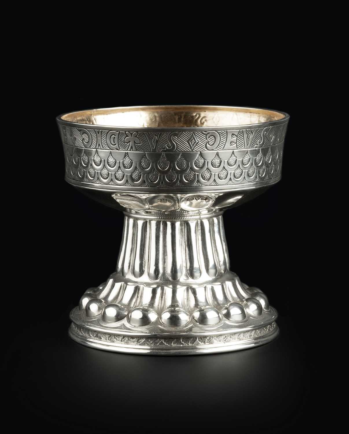 A silver replica of the Tudor Holms cup, the faceted and engraved bowl with inscription '