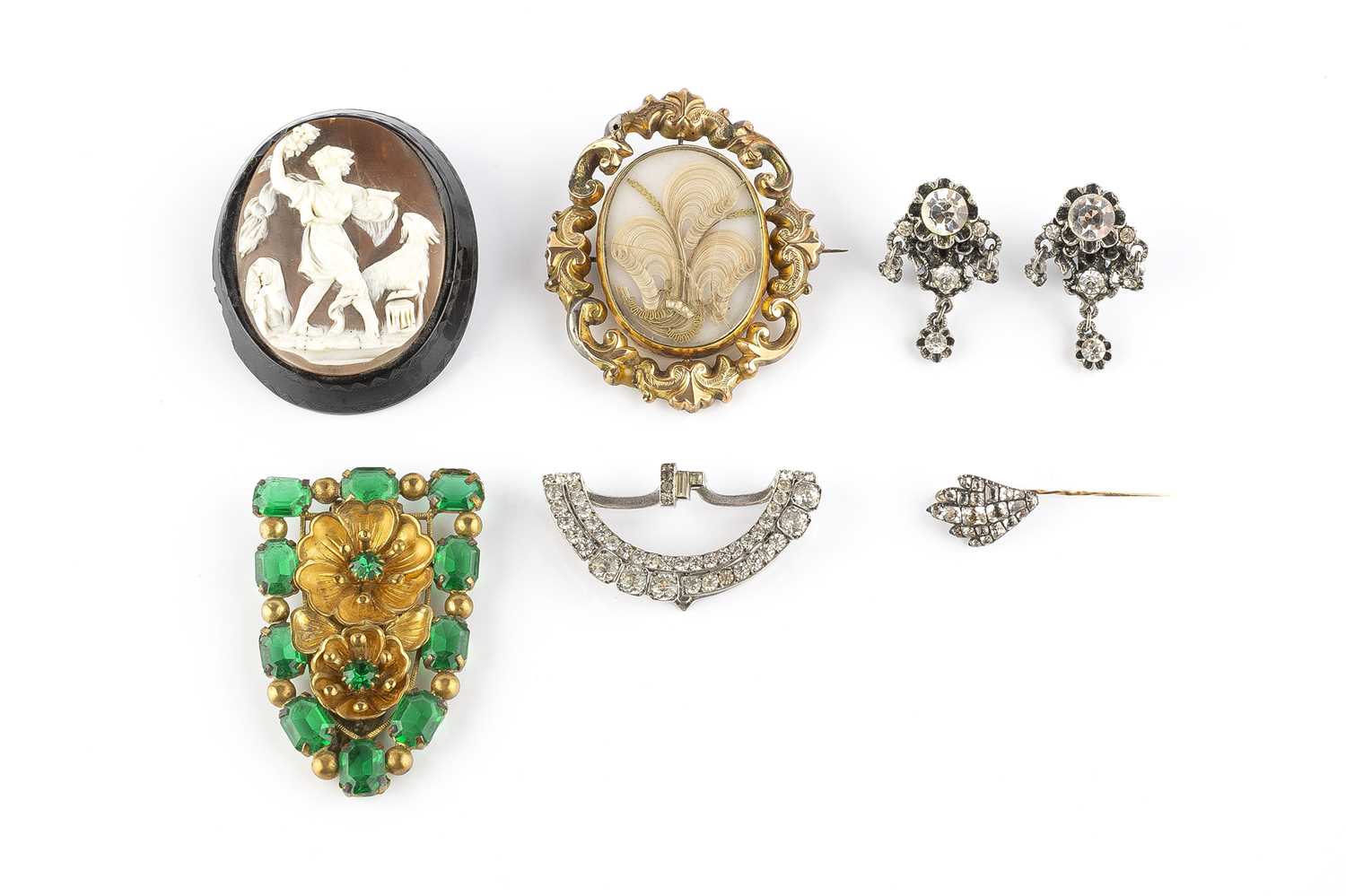 A collection of antique and later jewellery, comprising a Georgian white paste panel, with foiled