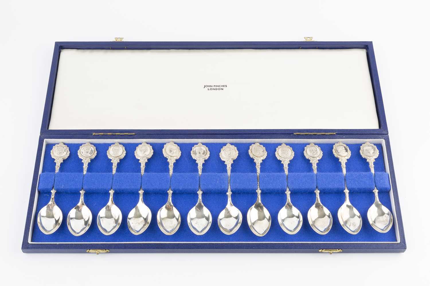 A set of twelve silver limited edition 'Roman' spoons, sculpted by David Cornell by John Pinches