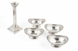 A silver candlestick, of fluted Corinthian form, on beaded stepped square base, by Britton,