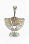 A late 19th century Hanau silver basket, of swing handled oval form, pierced and embossed with putti