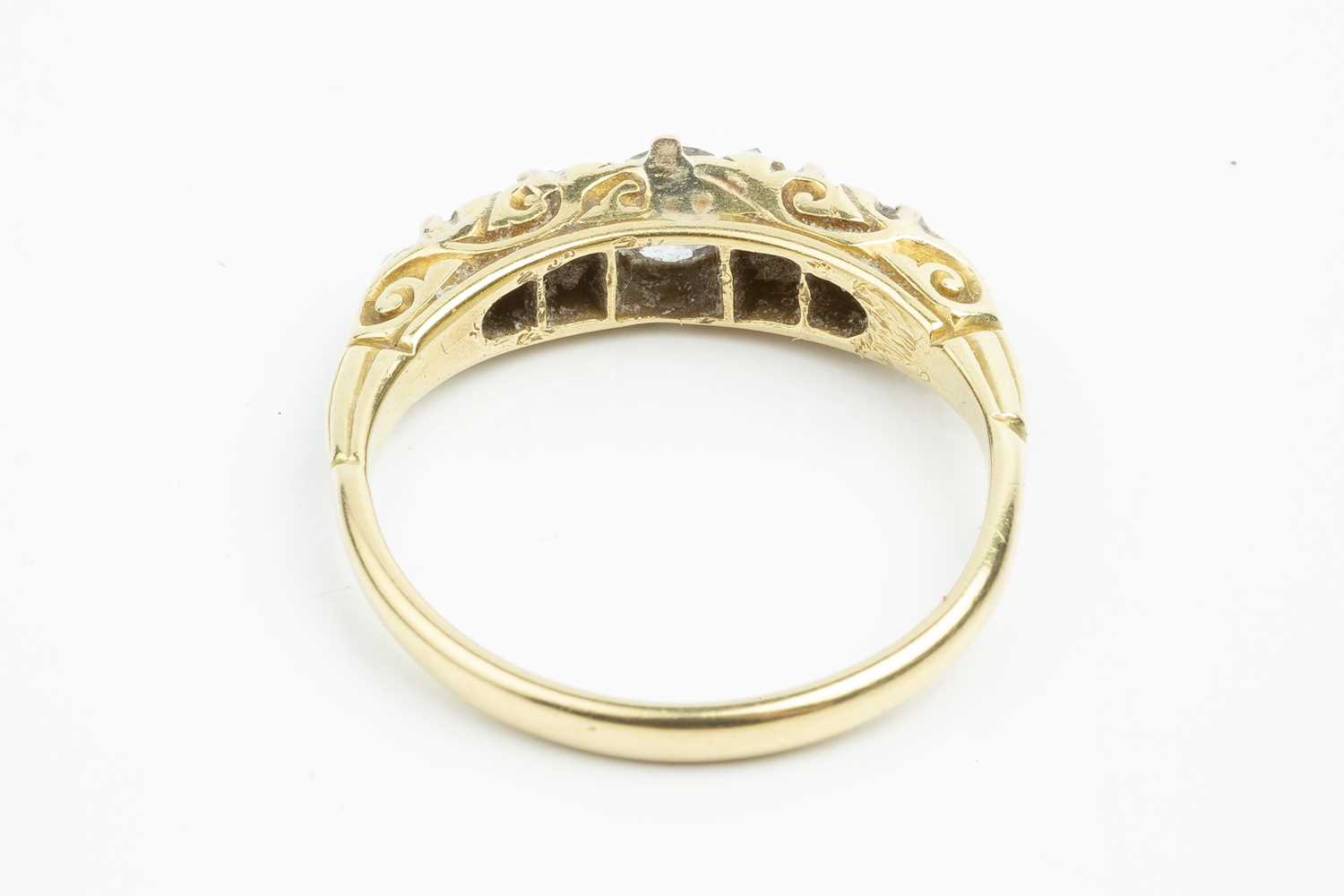 A diamond five stone ring, the scrolled hoop set with graduated old and Swiss-cut diamonds, spaced - Image 2 of 3