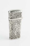 A William IV silver étui, embossed and engraved with flowers and foliage, and containing two