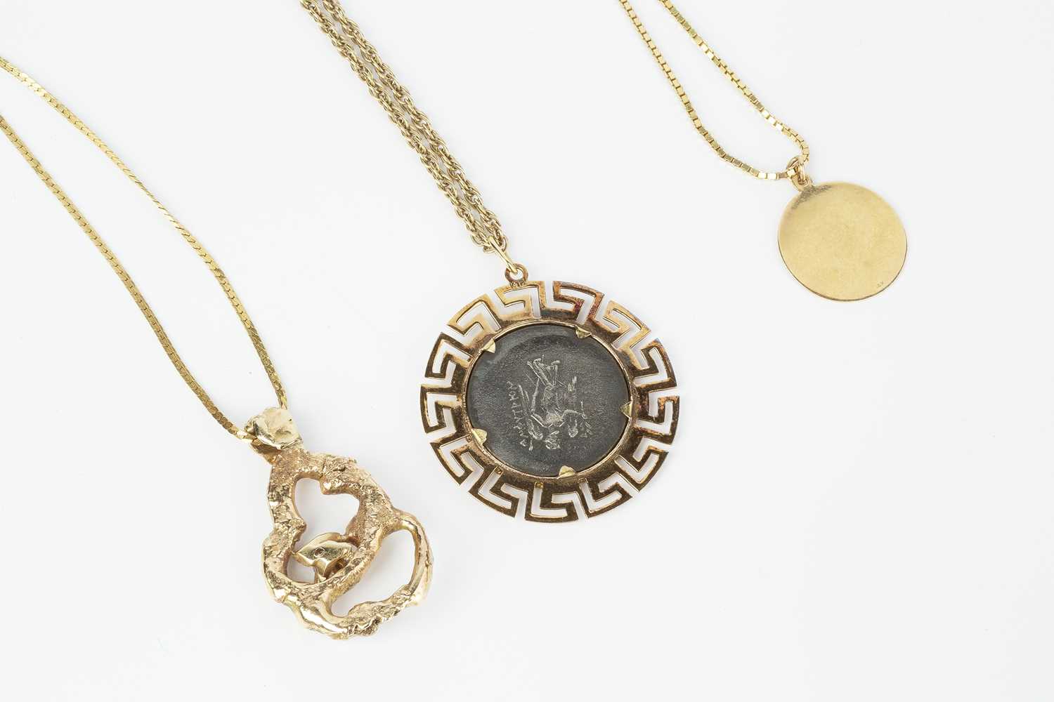 A diamond set pendant on chain, the abstract openwork pendant of nugget form, highlighted by a round - Image 2 of 2