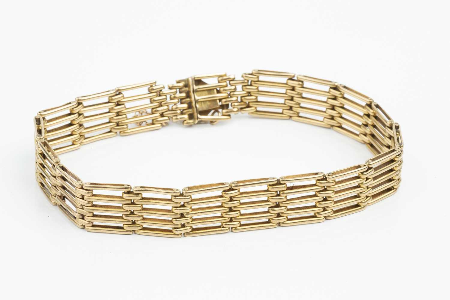 A yellow precious metal gate-link bracelet, stamped '9ct', length 18cmCondition report: General - Image 2 of 2