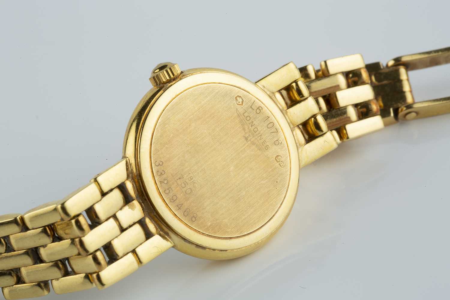 A lady's 18ct gold bracelet watch by Longines, the circular white dial with gilt Roman numeral - Image 4 of 4