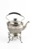 A late Victorian silver tea kettle on stand, with half lobed decoration, having ebonised fixed