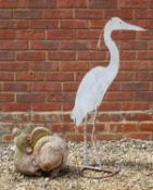 A painted wrought iron ornamental heron profile 98cm high together with a small sculpture of a