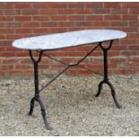 A marble topped conservatory table with rounded ends on a cast iron base, 120cm x 60cm x 75.