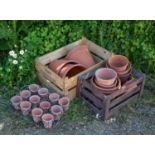 Three large flower pot, 32cm diameter together with a box of smaller flowerpots and a wirework