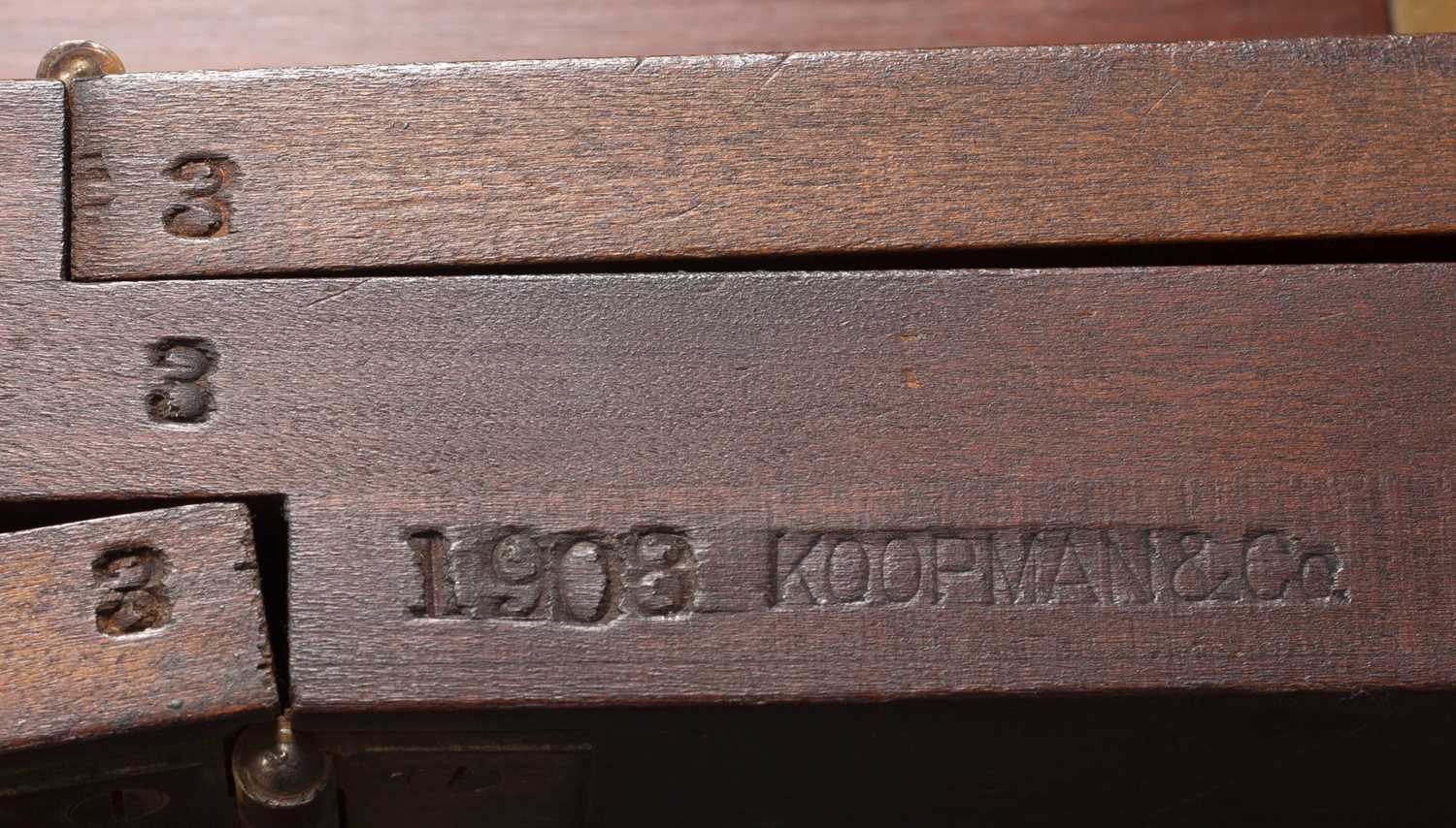 A Dutch mahogany Sutherland table profusely decorated with floral inlay stamped KOOPMAN and Co 1903, - Image 7 of 7