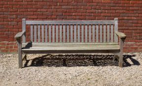 An old teak garden bench 213cm wideCondition report: The front rail damaged and detached, signs of