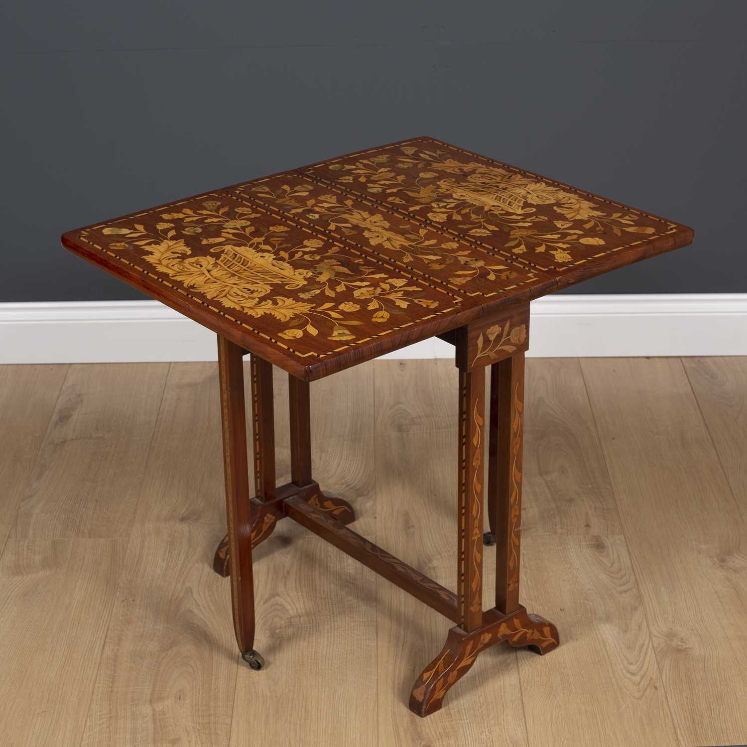 A Dutch mahogany Sutherland table profusely decorated with floral inlay stamped KOOPMAN and Co 1903, - Image 4 of 7