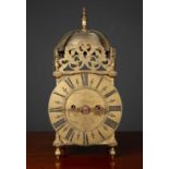 A 17th century style brass lantern clock 17cm wide x 14cm deep x 35cm highCondition report: Handle