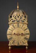 A 17th century style brass lantern clock 17cm wide x 14cm deep x 35cm highCondition report: Handle