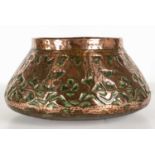 A Middle Eastern embossed copper bowl decorated with a procession of animals, 28cm diameter x 14cm