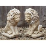 A pair of cast reconstituted stone seated lions 43cm highCondition report: At present, there is no