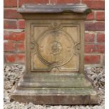 A Victorian buff terracotta plinth with floral rosette ornament and stepped base, 38cm wide x 50cm