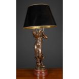 A table lamp constructed from a bronzed French spelter sculpture, on a turned marble plinth base,