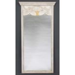 A French pier glass or wall mirror, white painted, the mirror plate with flowering vase crest,