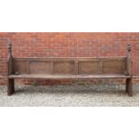 A Victorian pine pew with carved finials to each end, 276cm wideCondition report: In very poor