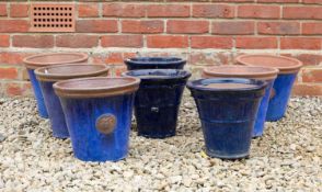 A group of eight various blue glazed terracotta plant pots each 28.5cm diameter x 25cm highCondition