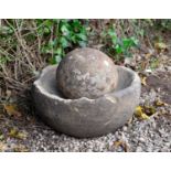 An ancient mortar stone and spherical grindstone, found in Cheshire, 34cm diameterCondition