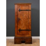 An elm arts and crafts style cupboard with wrought iron strapwork hinges, 78.5cm wide x 40.5cm