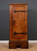 An elm arts and crafts style cupboard with wrought iron strapwork hinges, 78.5cm wide x 40.5cm
