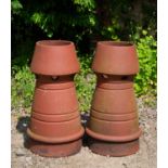 A pair of terracotta chimney pots with conical tops, 30cm diameter x 63cm highCondition report: In