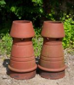 A pair of terracotta chimney pots with conical tops, 30cm diameter x 63cm highCondition report: In