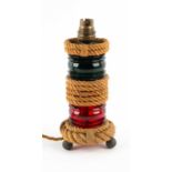 A French 'Marine' rope and glass table lamp on brass ball feet and with illumination from within,