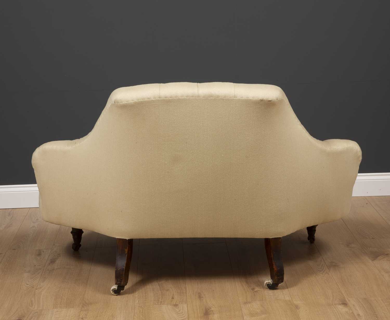 A Victorian shaped low conversation seat with button upholstered back and turned tapering legs to - Image 2 of 2