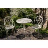 A white painted cast aluminium table and two chairs the table 75cm in diameterCondition report: At